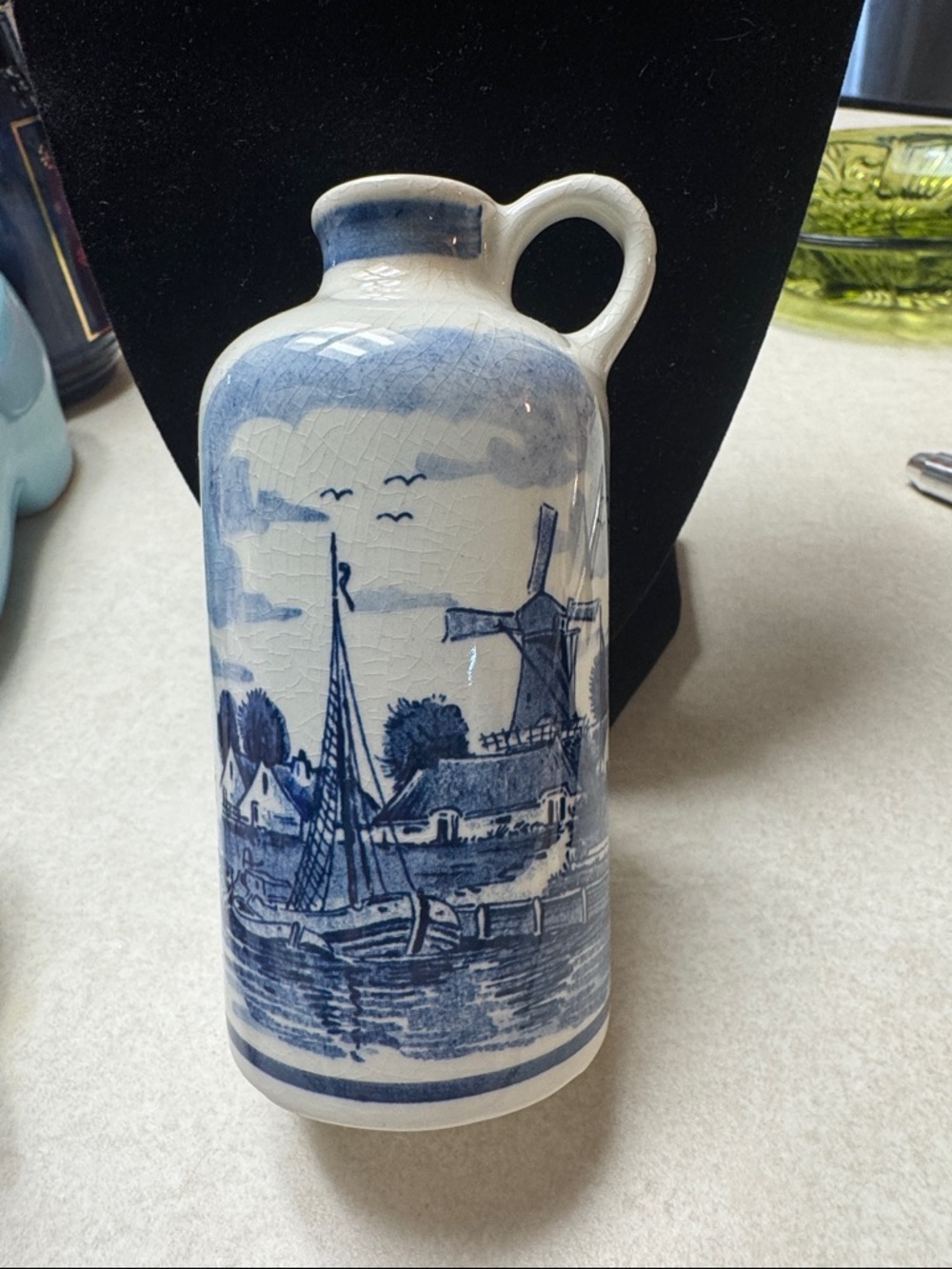 Blue and White Ceramic Decorative Pitcher with Nautical Scene